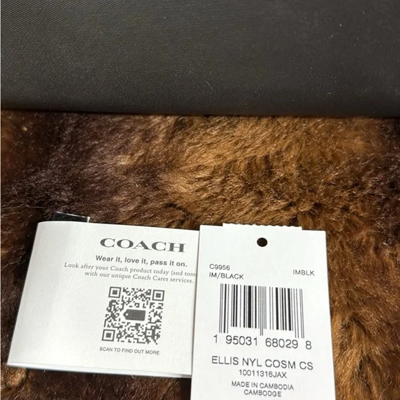 Coach Black Toiletry Bag with Gold Branding
